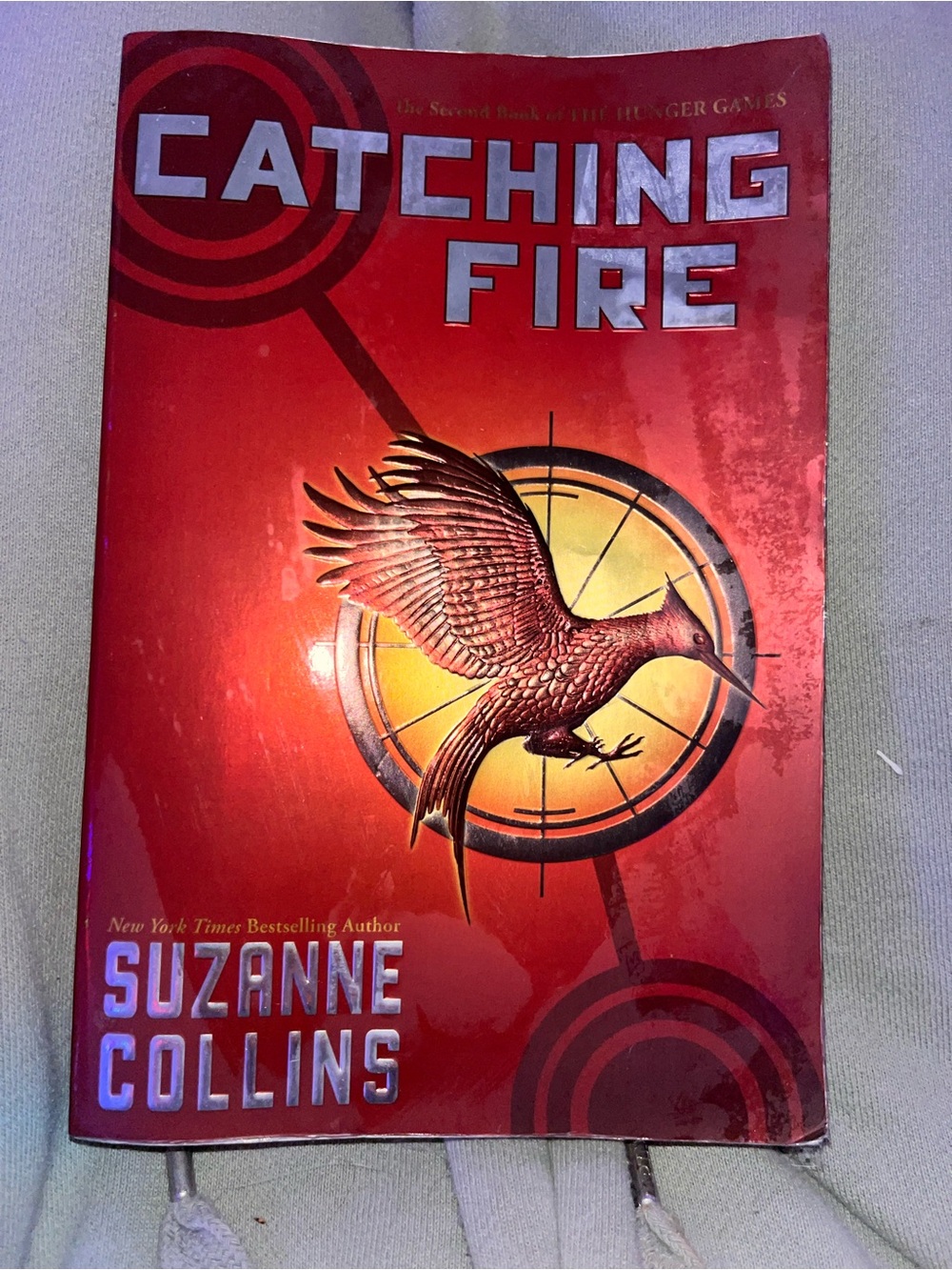 Scholastic The Hunger Games Paperback - Red with Gold Text